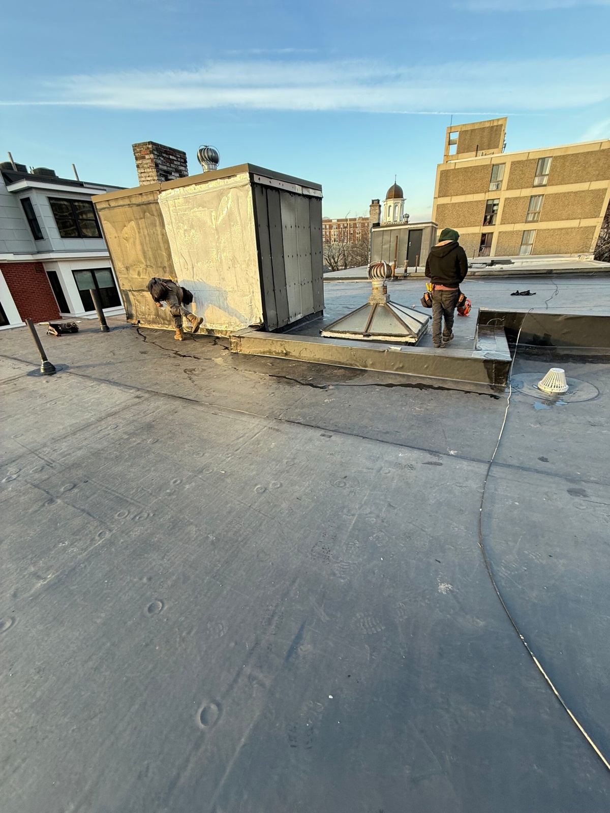 Flat roof membrane installation