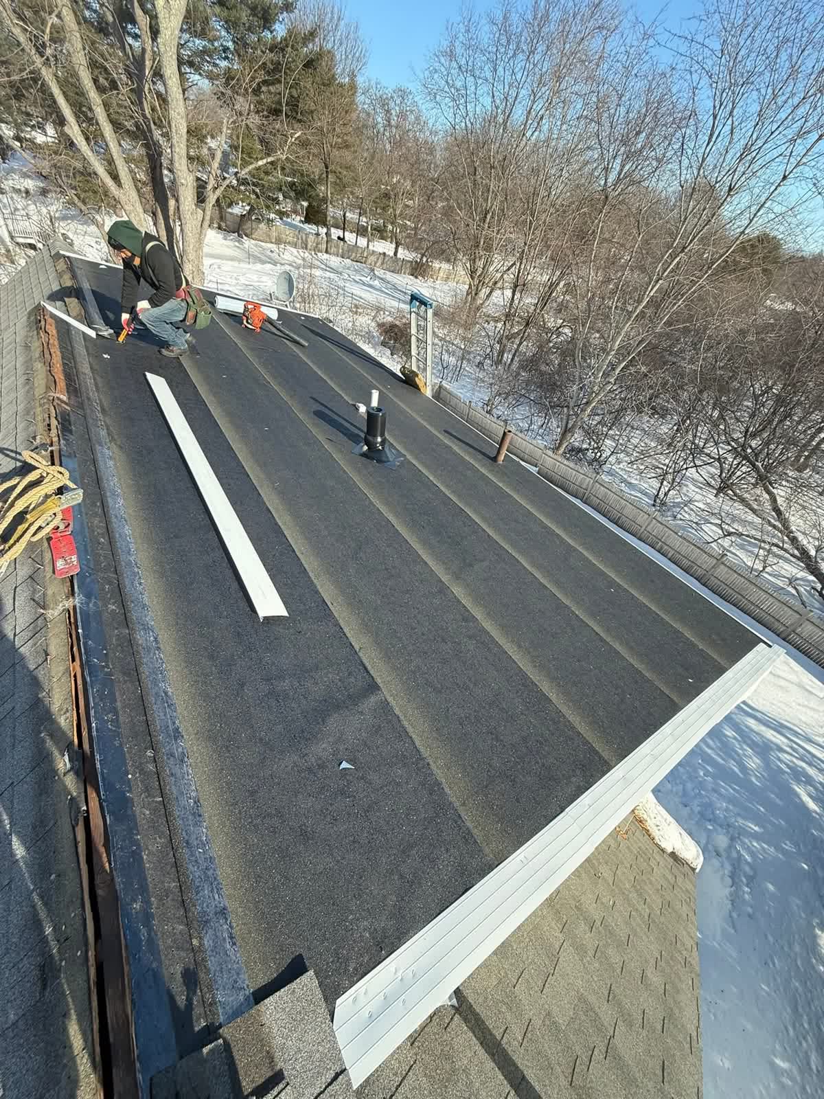 Low-slope roof going down
