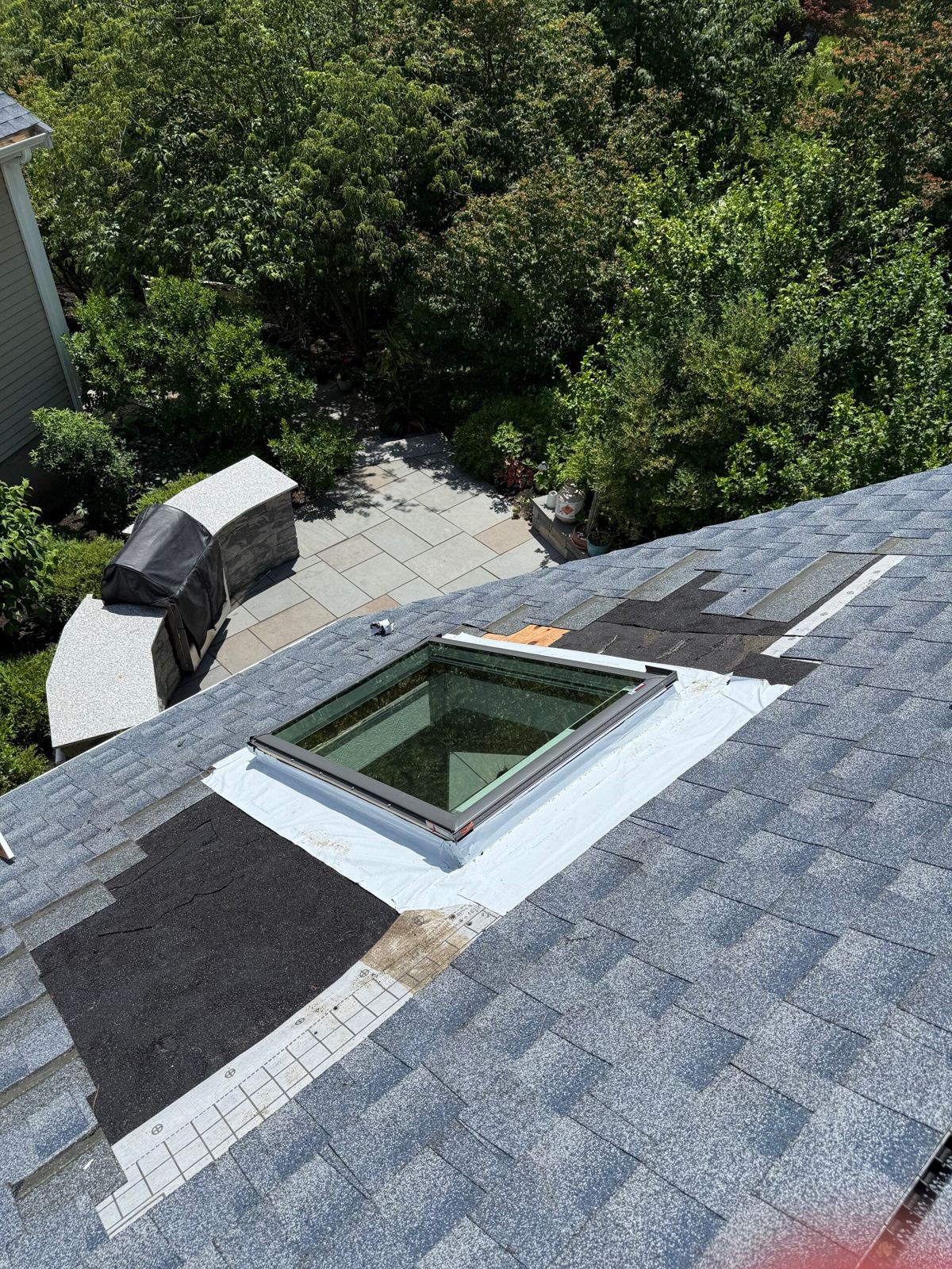 Roof repair: new flashing around a skylight